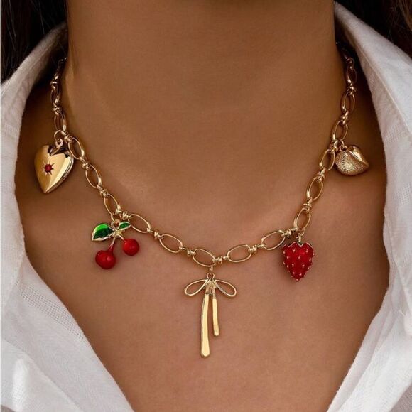 Free People Jewelry - Gold red multiple Charm Necklace N1070